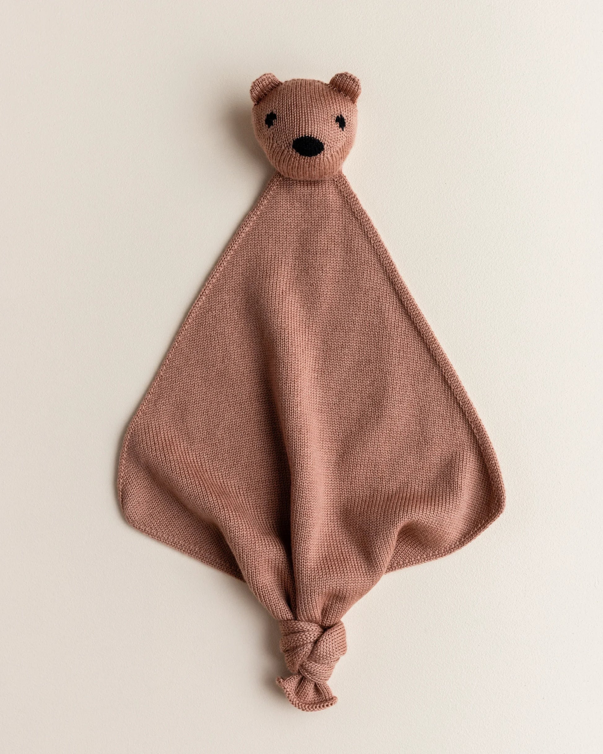 Nusseklud fra Hvid Teddy Tokki Merinould - Terracotta