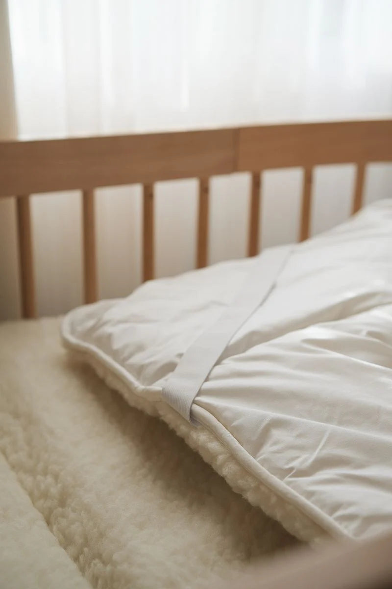 Rullemadras i merinould til baby og barn - Tremmeseng